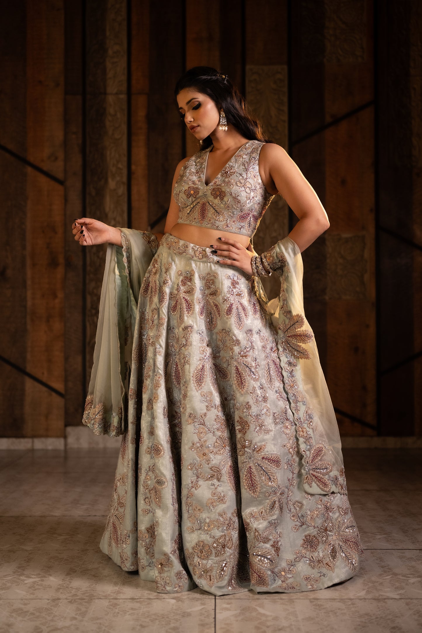 A Symphony of Tradition in Ice Mint Green Organza Lehenga