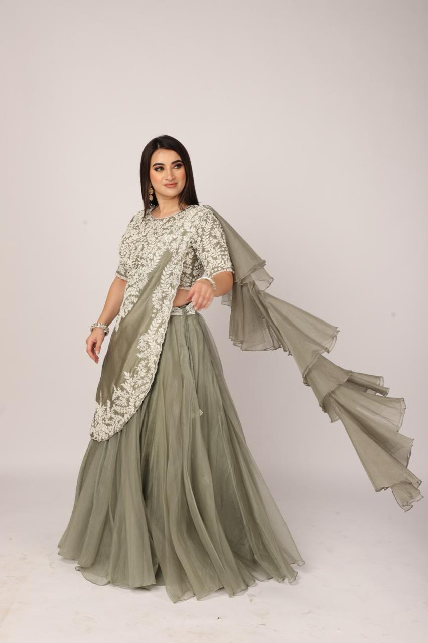 Serene English Green Draped Skirt Set with Ruffle Dupatta