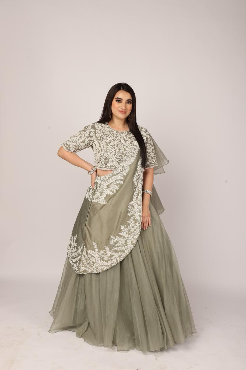 Serene English Green Draped Skirt Set with Ruffle Dupatta