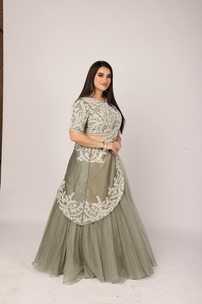 Serene English Green Draped Skirt Set with Ruffle Dupatta