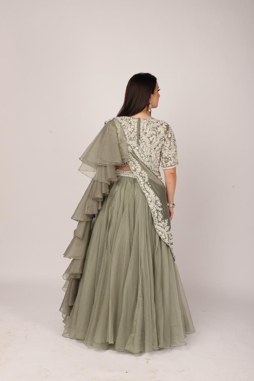 Serene English Green Draped Skirt Set with Ruffle Dupatta